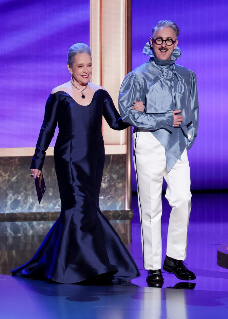 Kathy Bates and Alan Cumming at the 77th Primetime Emmy Awards held at the Peacock Theater on September 14, 2025 in Los Angeles, California