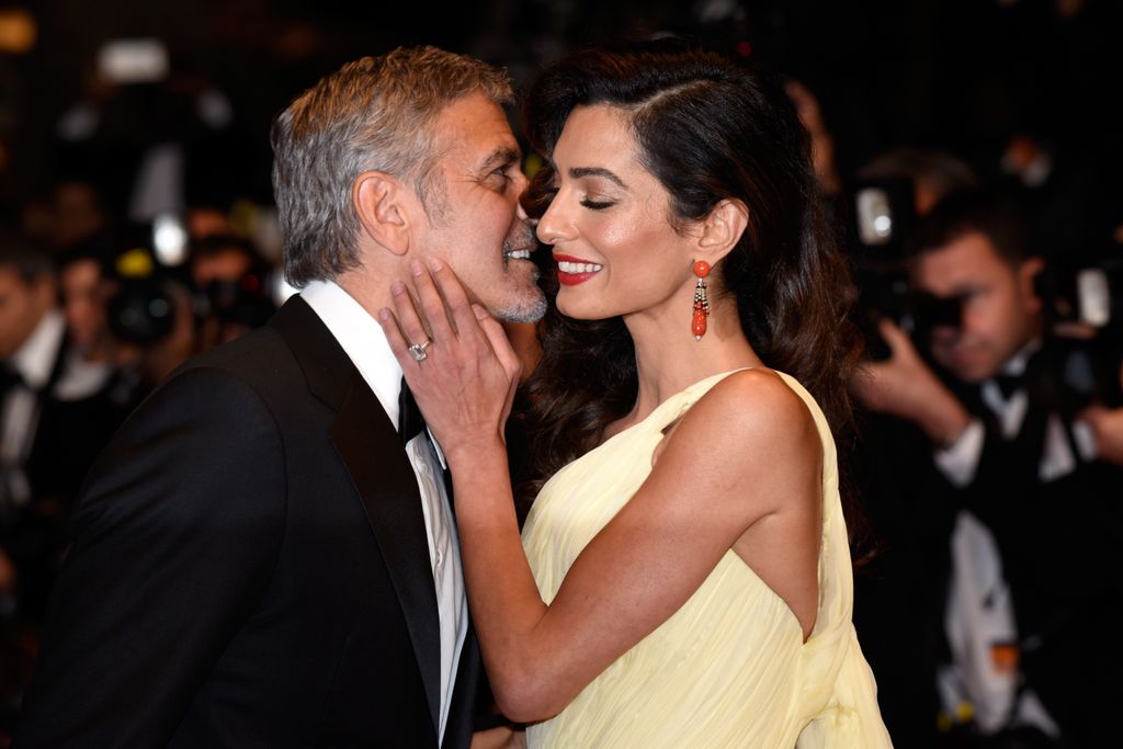 Actor George Clooney and his wife Amal Clooney attend the "Money Monster" premiere during the 69th annual Cannes Film Festival at the Palais des Festivals on May 12, 2016 in Cannes, France