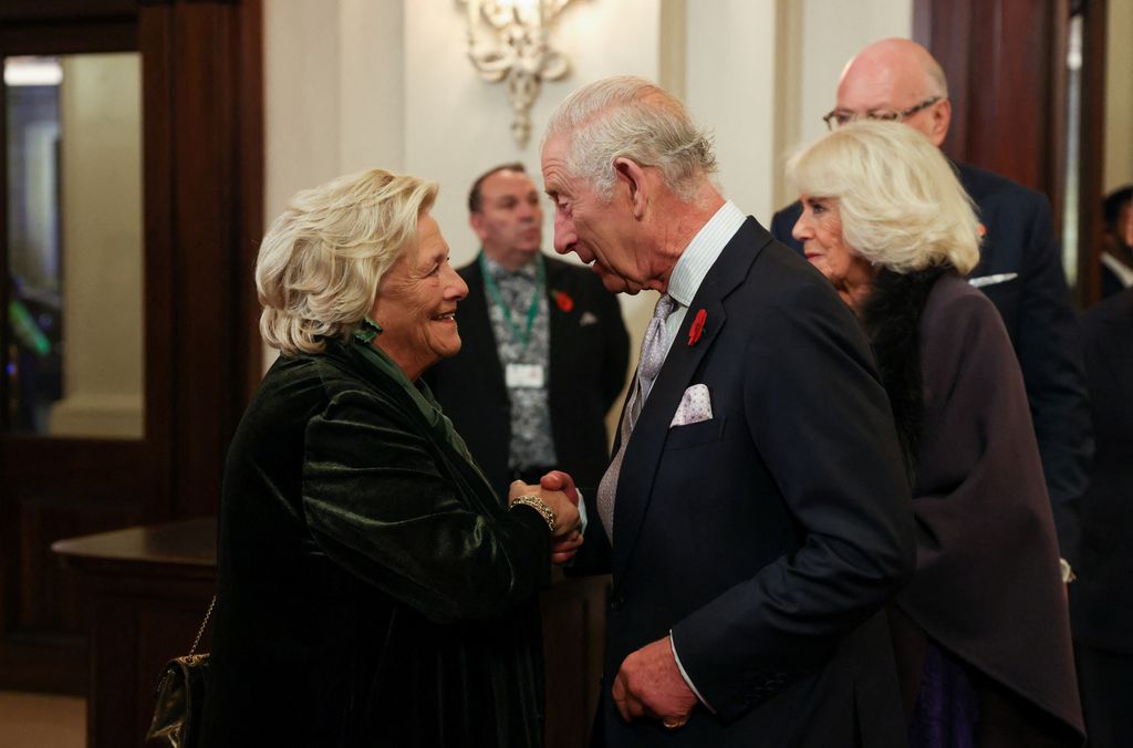 King Charles III is greeted by Vice-President of the Royal Opera House Dame Vivien Duffield