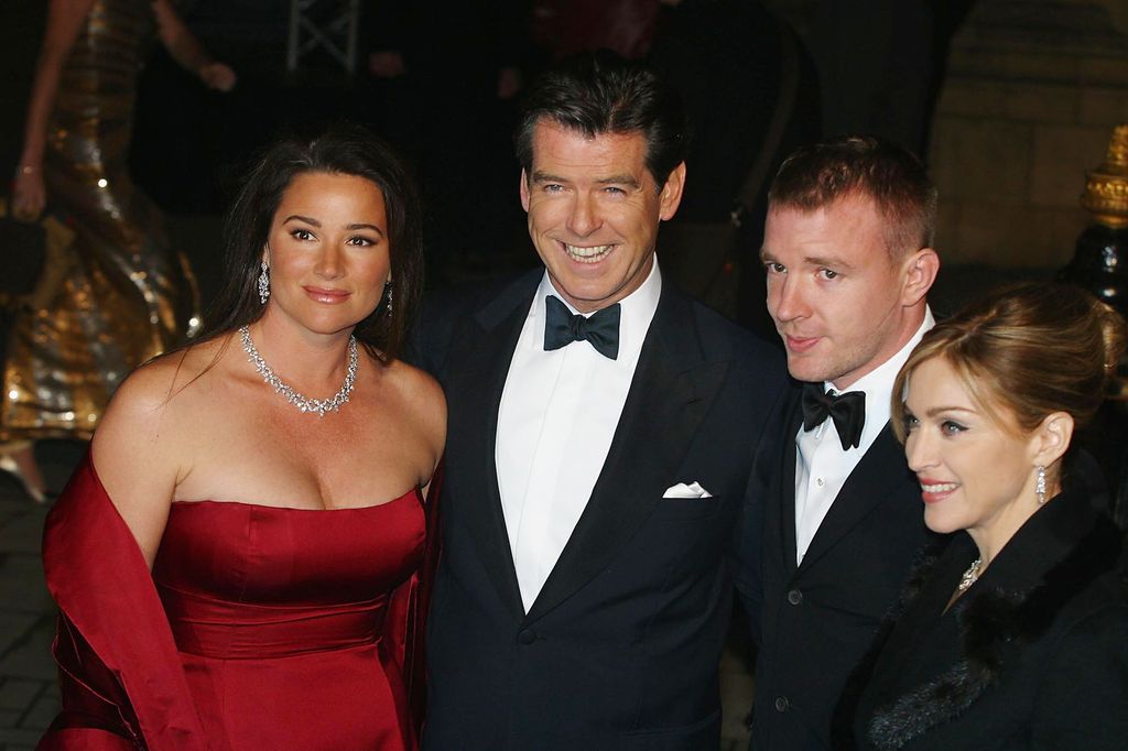 Keely Shaye standing with Pierce Brosnan, Guy Ritchie and Madonna