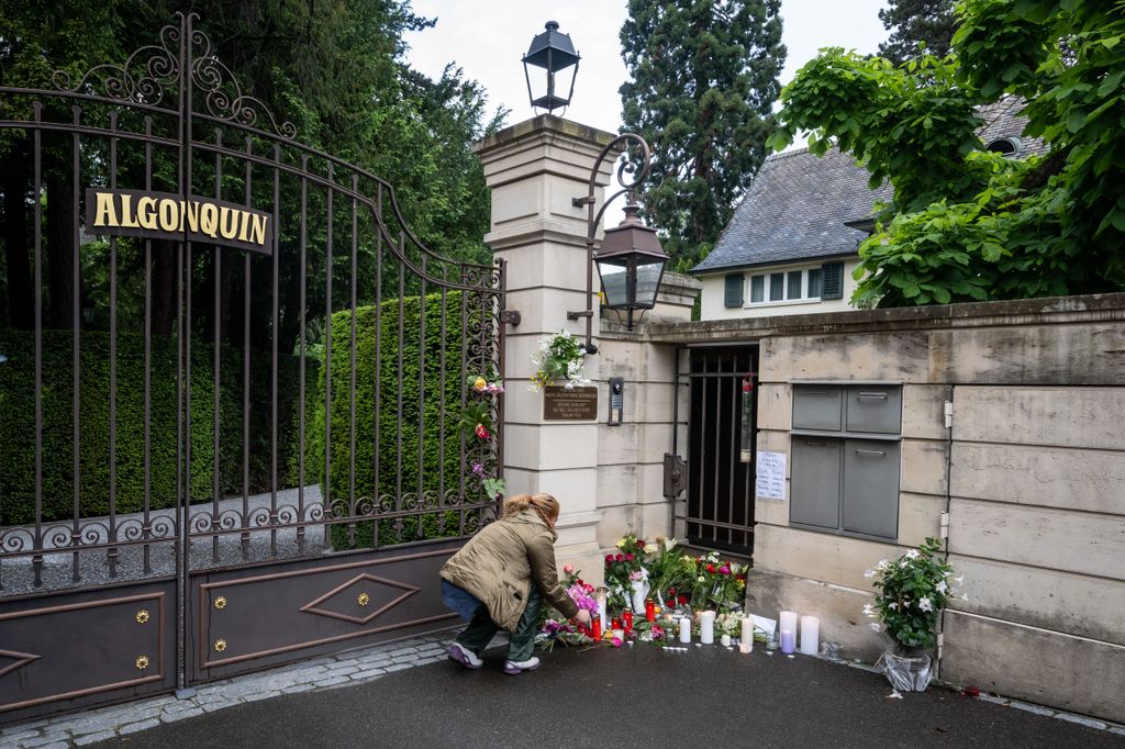  A mourner lays flowers outside the estate of late singer Tina Turner 