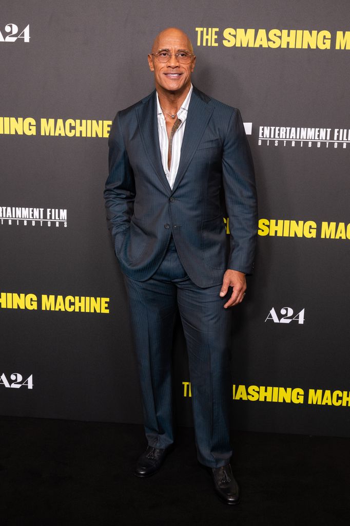 Dwayne Johnson in navy suit 