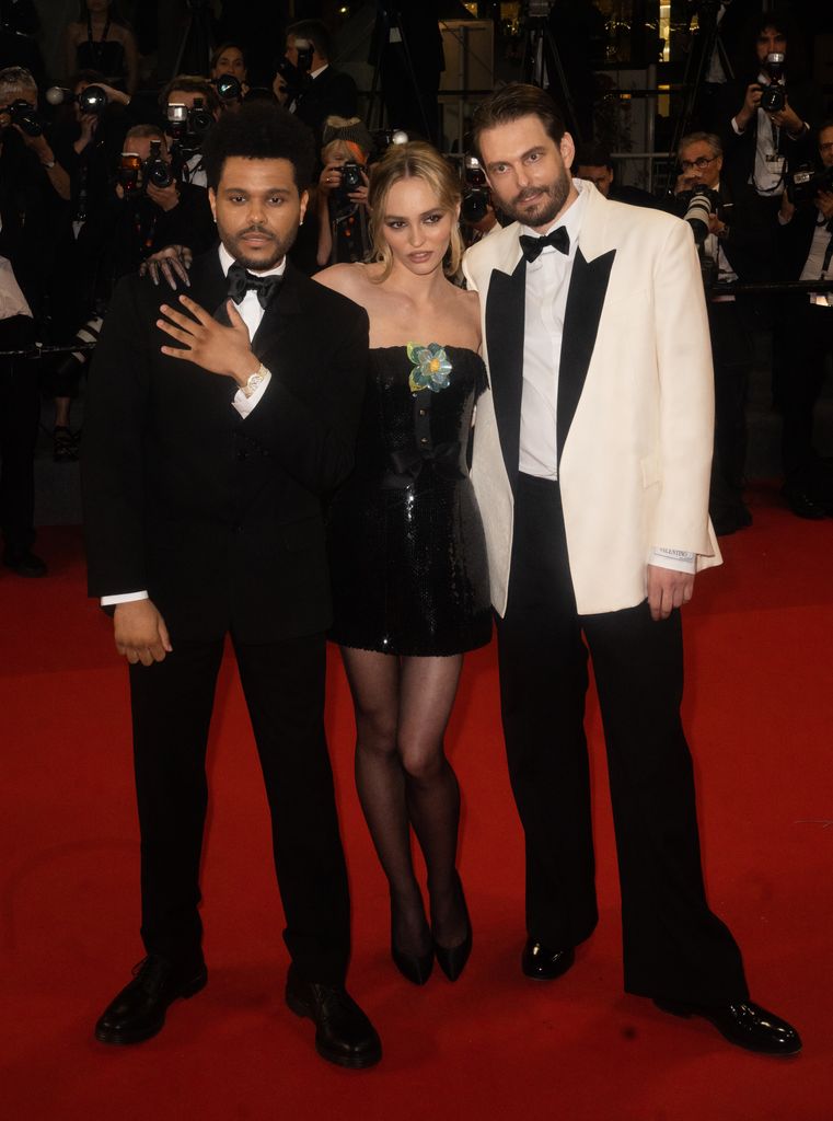 Lily-Rose Depp, Sam Levinson and The Weeknd on the red carpet 