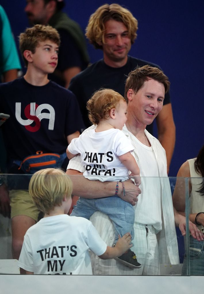 Robbie and Phoenix wore T-shirts emblazoned with 'THAT'S MY PAPA!'