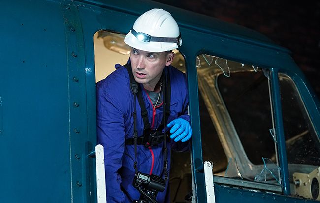 David Caves looks out of train on Silent Witness