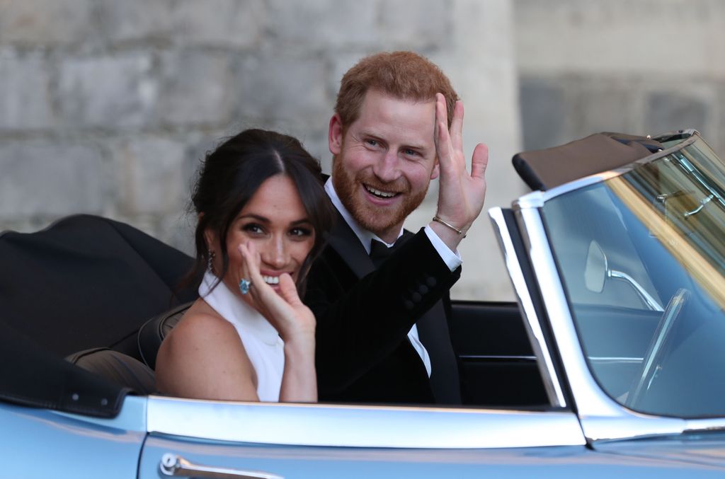 Prince Harry driving Meghan Markle on their wedding day