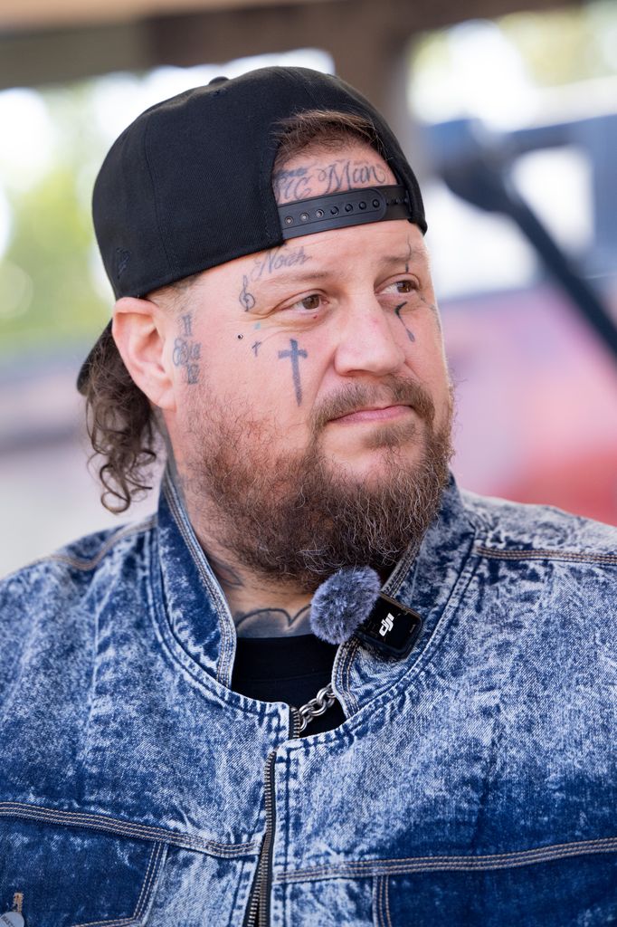 photo of jelly roll wearing backward baseball cap