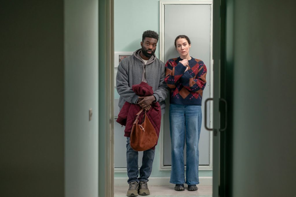 man and woman outside doctor's office