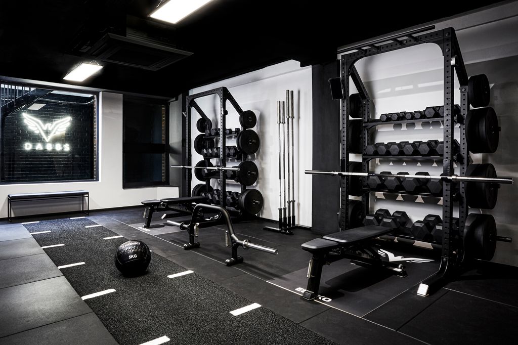 black and white photo inside a gym