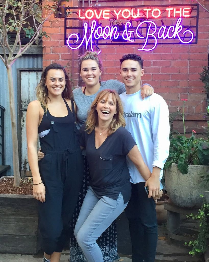 mother with three grown-up children, two daughters and son