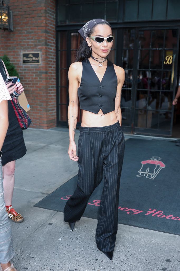 Zoë Kravitz was spotted in NYC while promoting her new film 'Caught Stealing' in waistcoat and trousers
