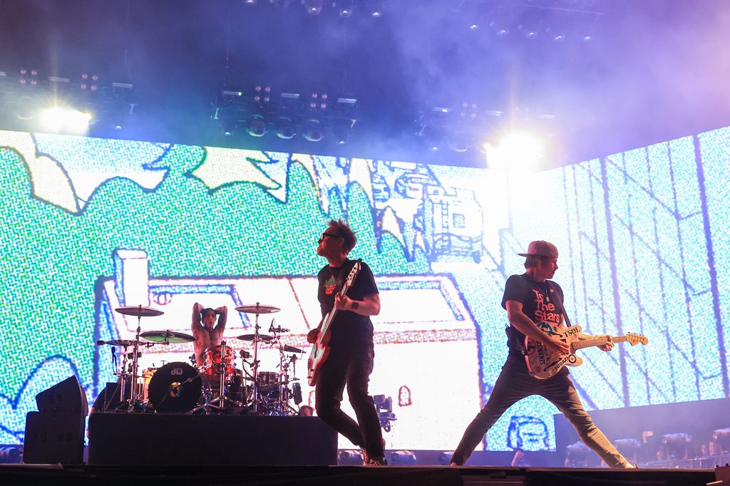 Travis Barker, Mark Hoppus and Tom DeLonge of Blink-182 perform onstage at Coachella