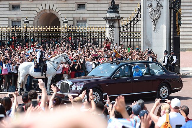 the queen prince charles leave palace car for state opening
