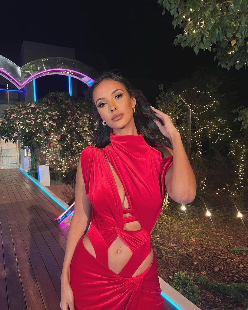 Maya Jama wears a red cut-out bodysuit and maxi skirt on Love Island