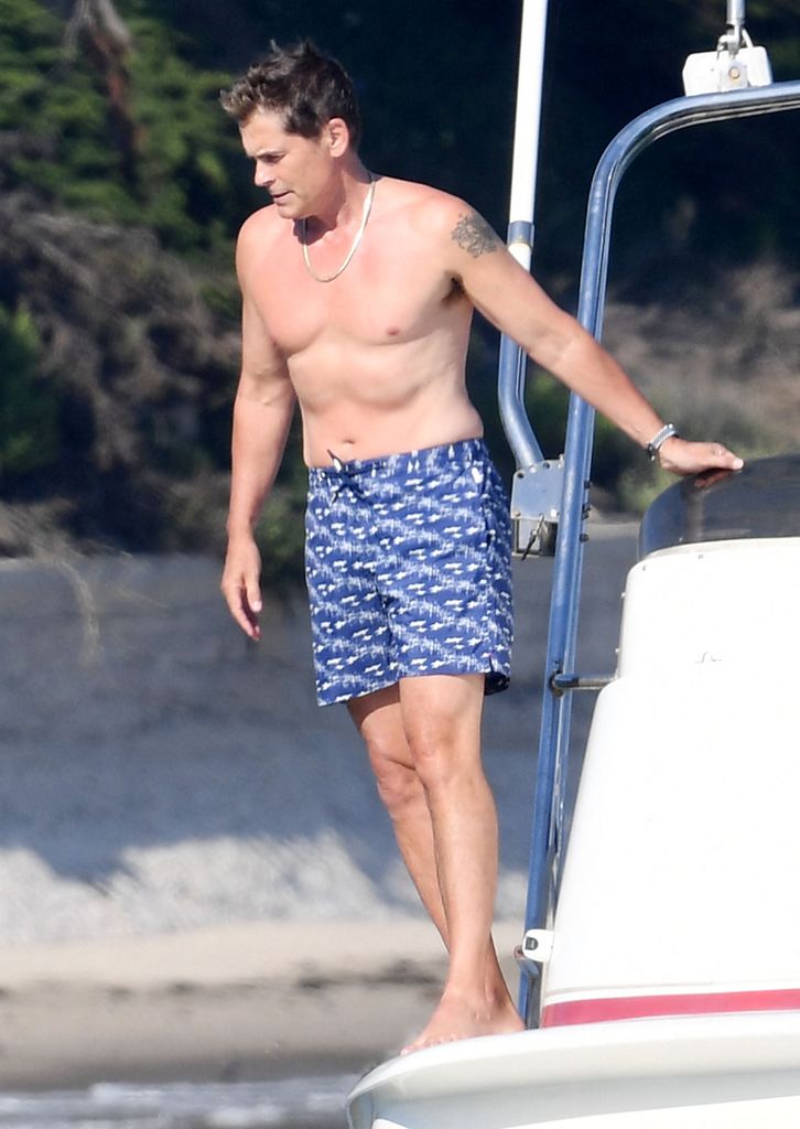 rob lowe shirtless jumping off a boat