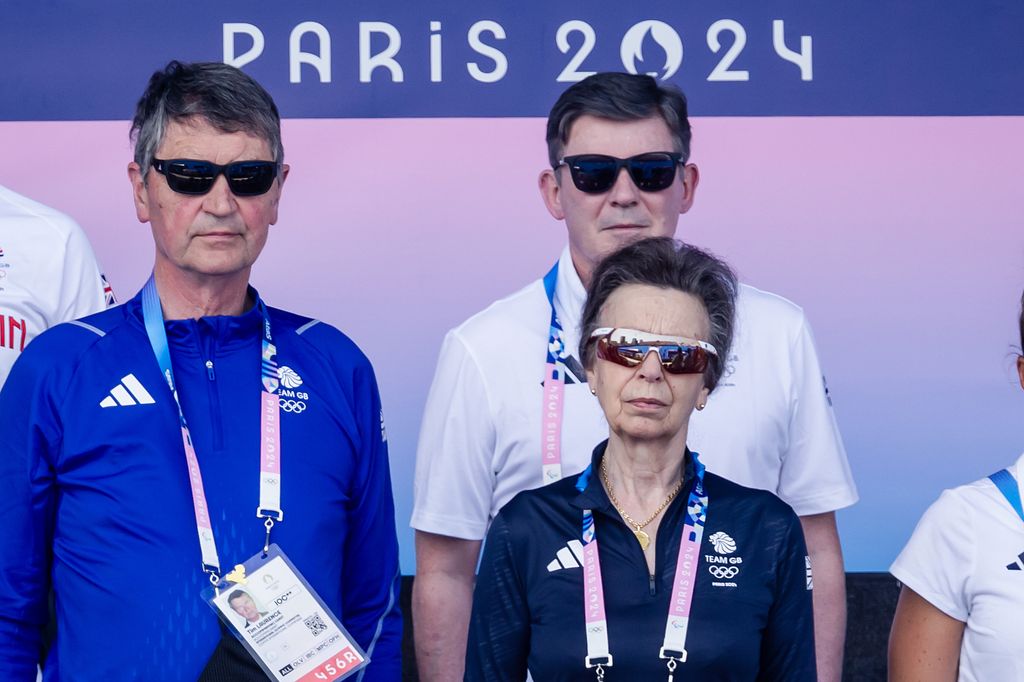 Princess Anne and Tim Laurence wearing sunglasses and Team GB kit