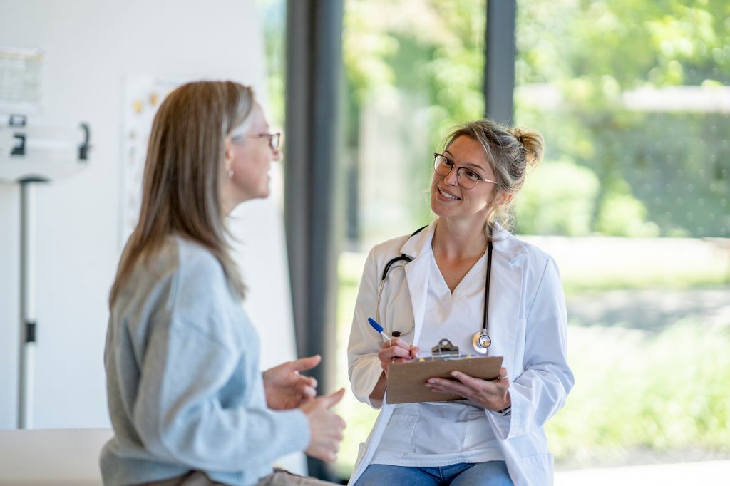 woman talkming to her doctor
