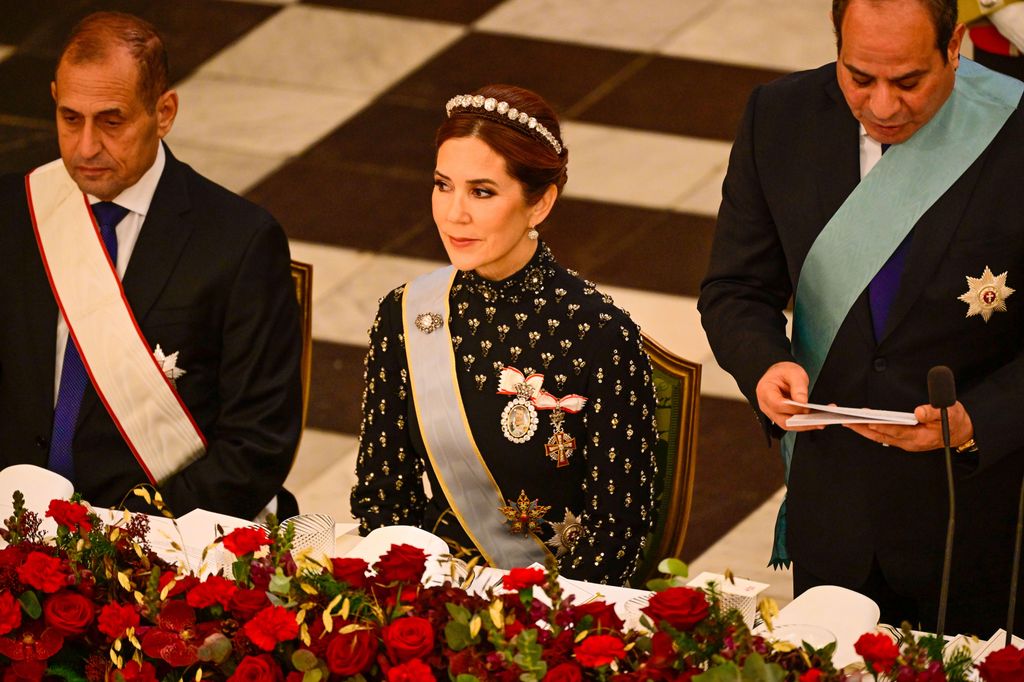 Queen Mary seated at Egypt state banquet