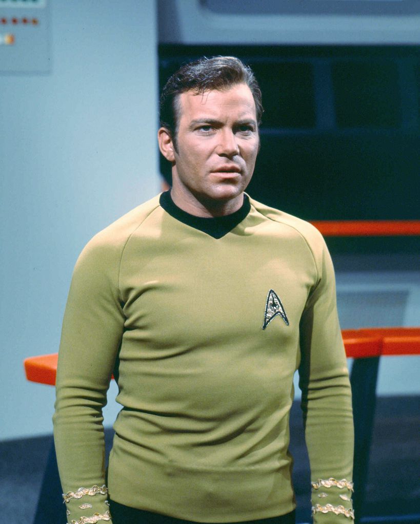 William Shatner as Captain James T. Kirk of the Starship Enterprise