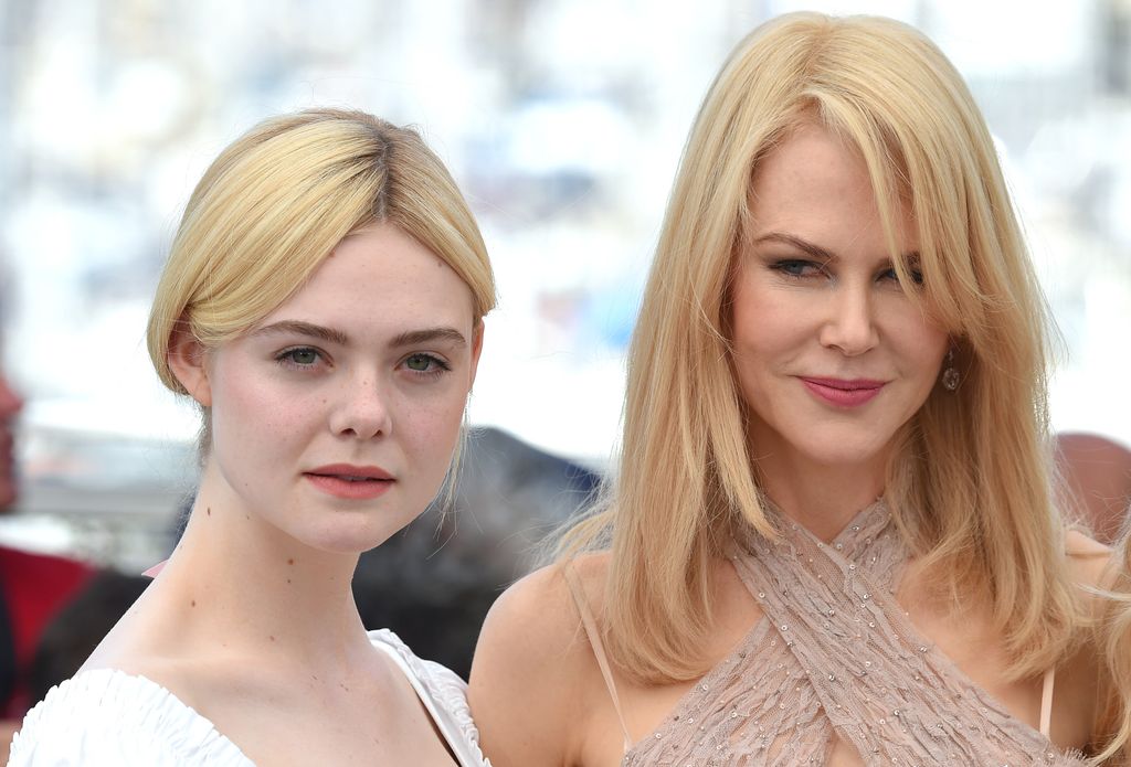 Elle and Nicole look ethereal on the red carpet with matching blonde hair and pale skin