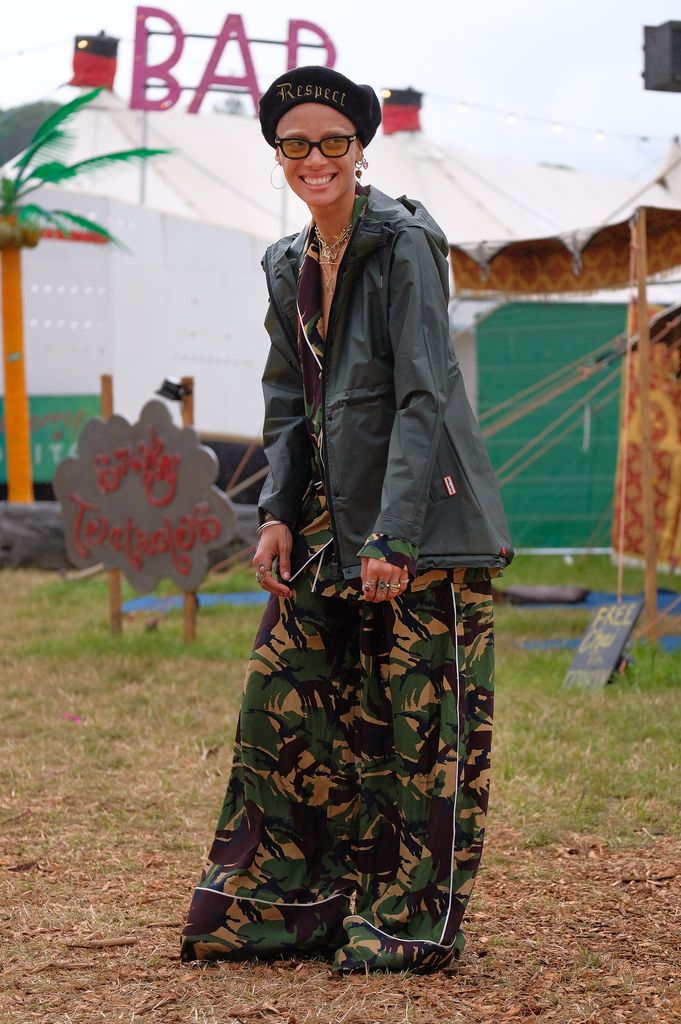 Adwoa Aboah attends day two of Glastonbury on June 24, 2017  in a pair of baggy camo print pants and a beret