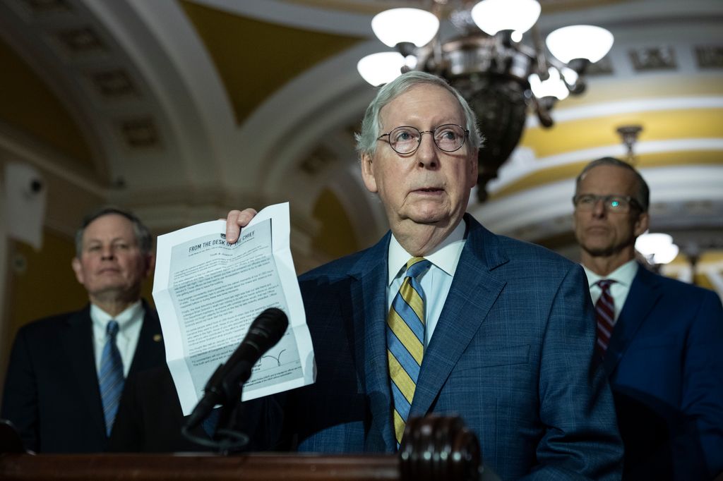 Senate Minority Leader Mitch McConnell (R-KY) holds up a letter from the U.S. Capitol Police as he denounces Fox News' Tucker Carlson's recent coverage of the January 6, 2021 attack on the Capitol, during a news conference at the U.S. Capitol on March 7, 