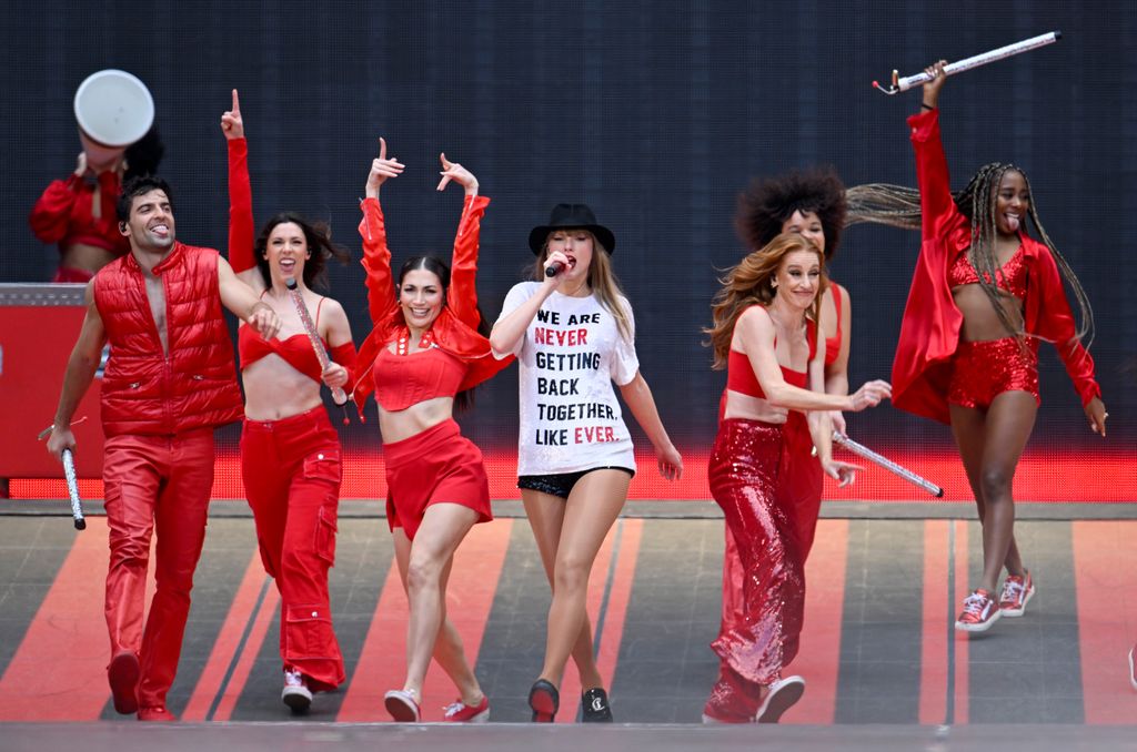 Taylor Swift dances during the Red segment on The Eras Tour