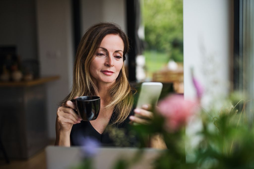 A woman working at home or in the office. Copy space.