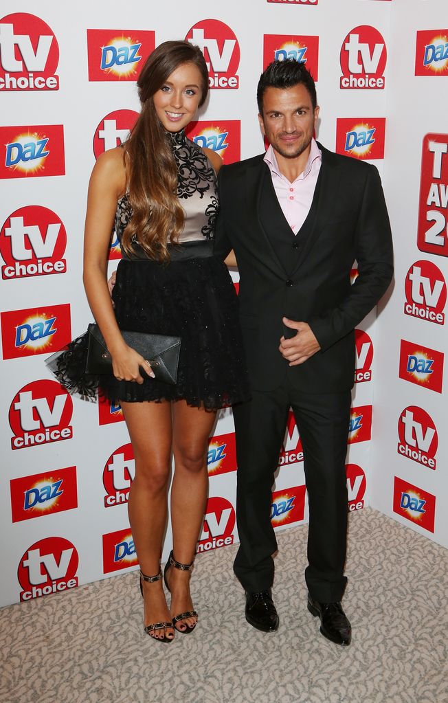 couple in black tie at awards show 