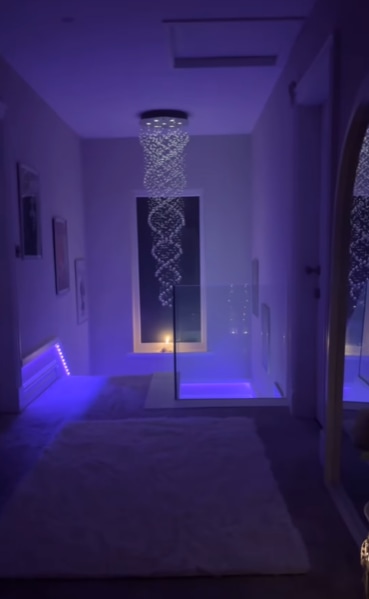 tulisa's purple lit hallway