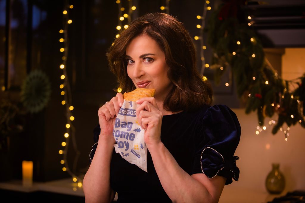 Nigella Lawson with a Greggs in her hands