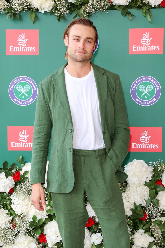 Douglas Booth green suit
