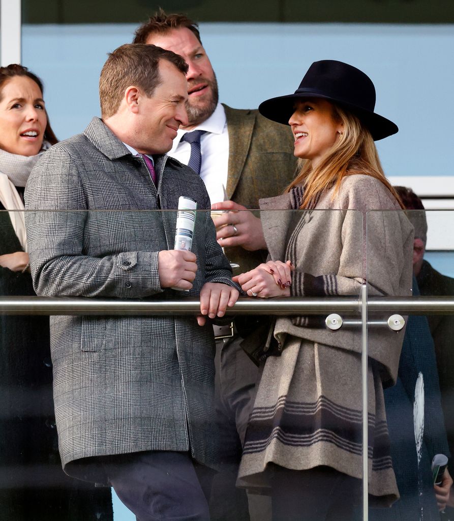 Peter Phillips and Harriet Sperling attend the New Year's Day Racing Meet at Cheltenham Racecourse