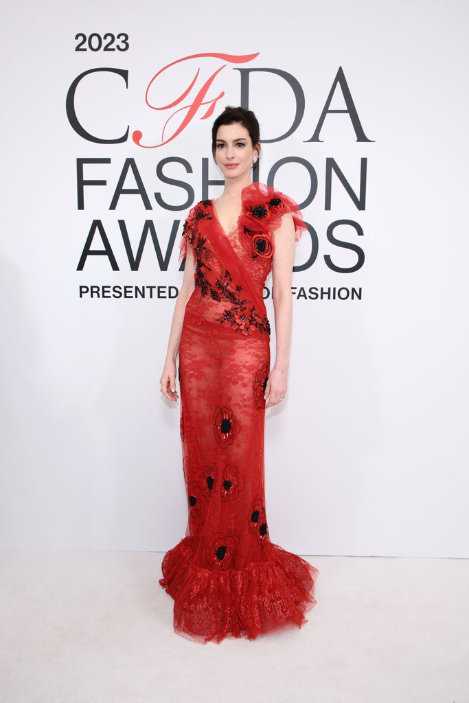 Anne Hathaway in red poppy dress