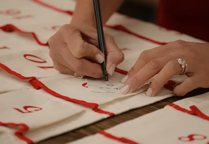 Meghan writing notes for Archie and Lilibet's advent calendars