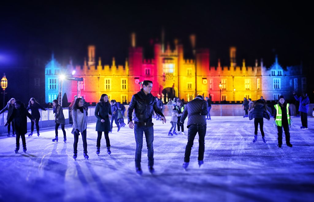 Skaters take to the ice at night at the ice rink at Hampton Court 