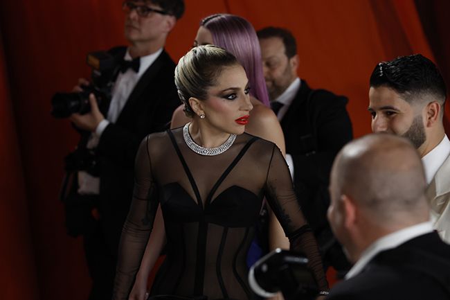 Gaga spots stumbling photographer