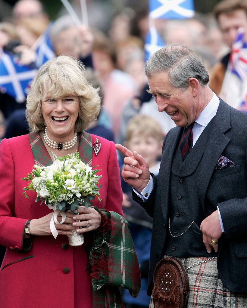 Then-Prince Charles, the Prince of Wales, and his wife Camilla, the Duchess of Cornwall, in their role as the Duke and Duchess of Rothesay undertake their first joint official engagement opening Monaltrie Park children's playground in Ballater near Balmoral on April 14, 2005 in Aberdeenshire, Scotland