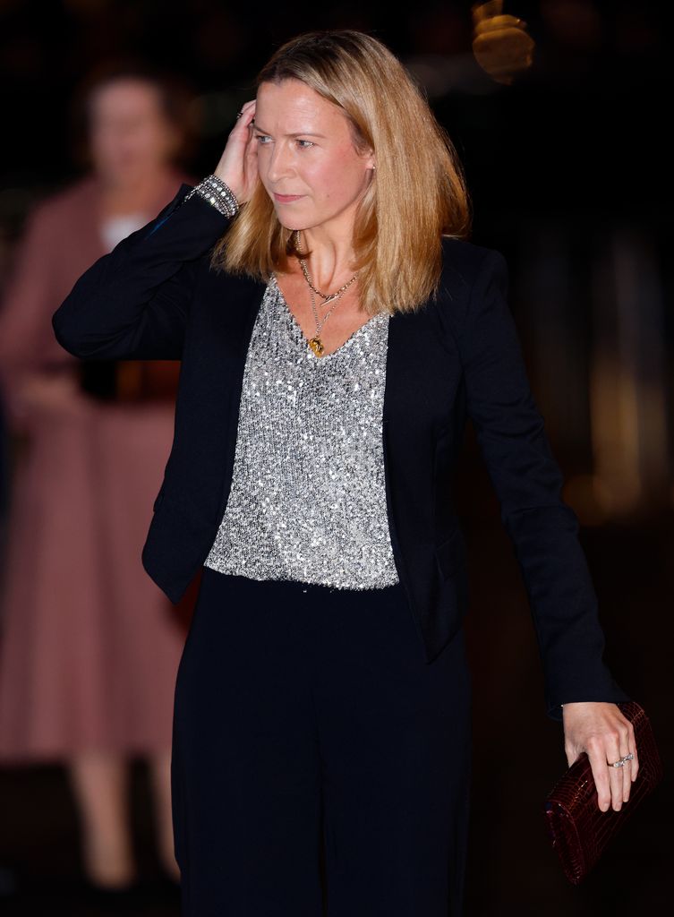 Lady Rose Gilman in a silver shirt and navy blazer