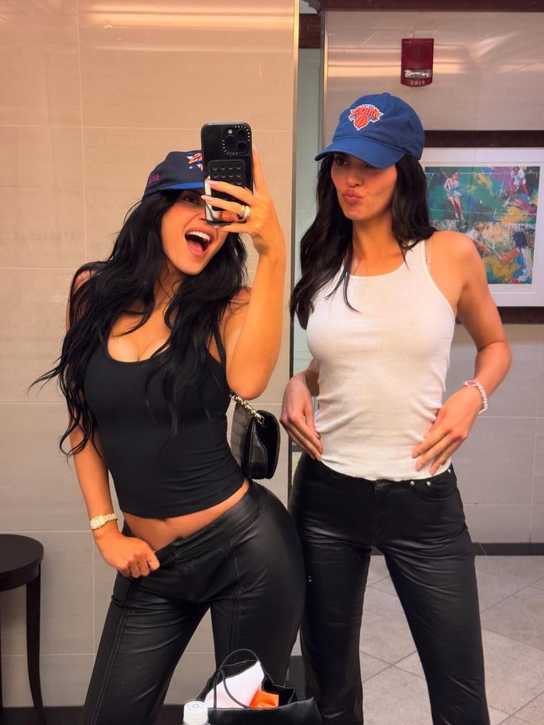 Kendall and Kylie in the Mirror Selfie wear suitable baseball caps