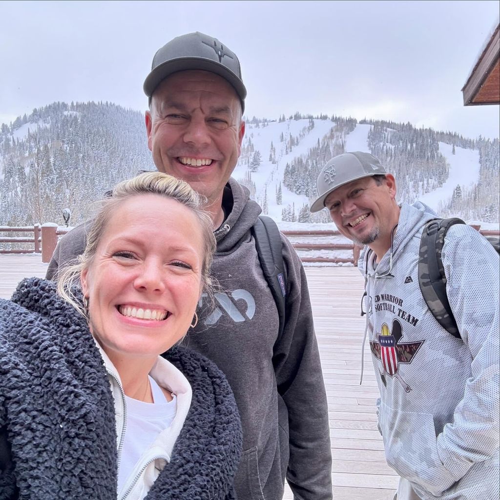 dylan dreyer posing in the mountains with her brothers james and mike