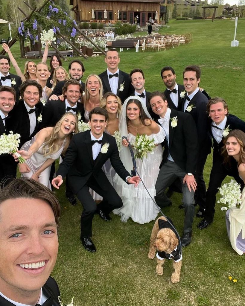 Taylor hill with her loved ones for a wedding selfie
