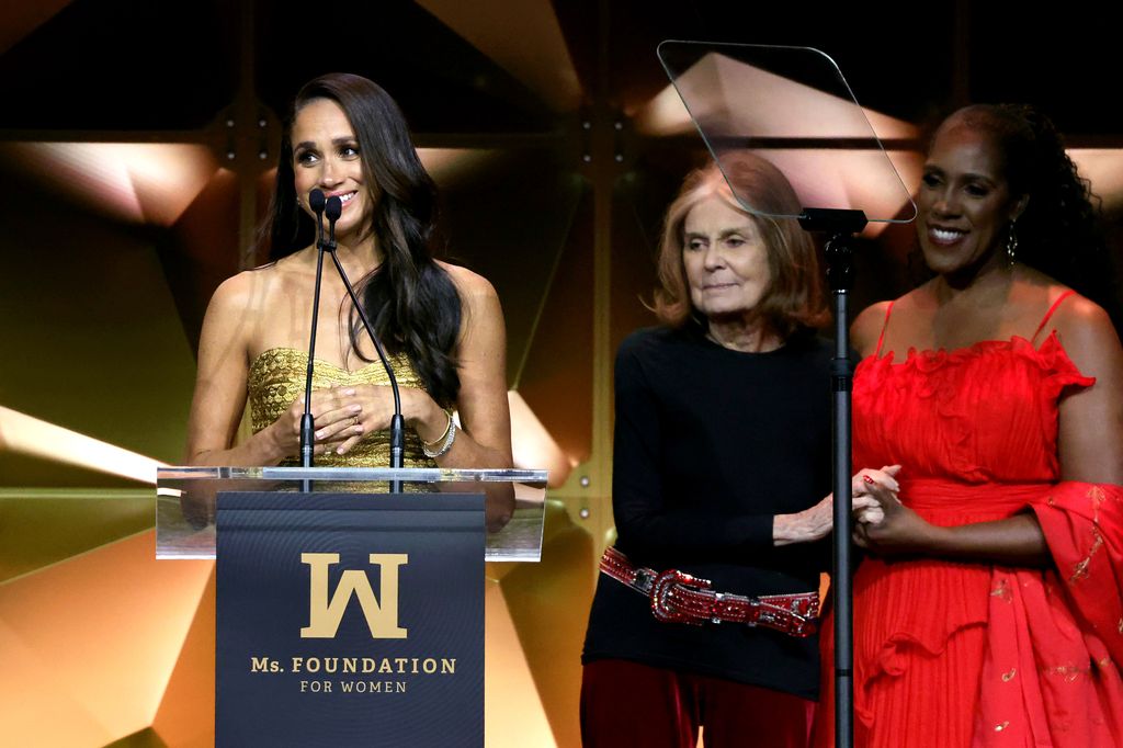 Meghan onstage with Gloria Steinem and Teresa Younger during the Ms. Foundation Women of Vision Awards