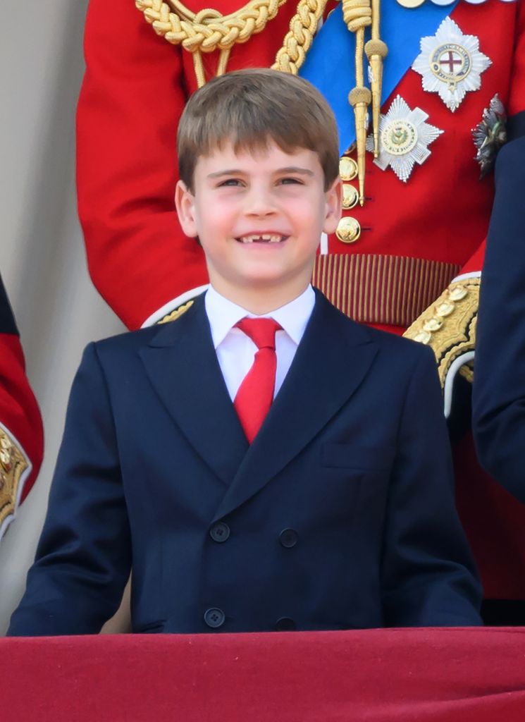 Prince Louis smiling in suit