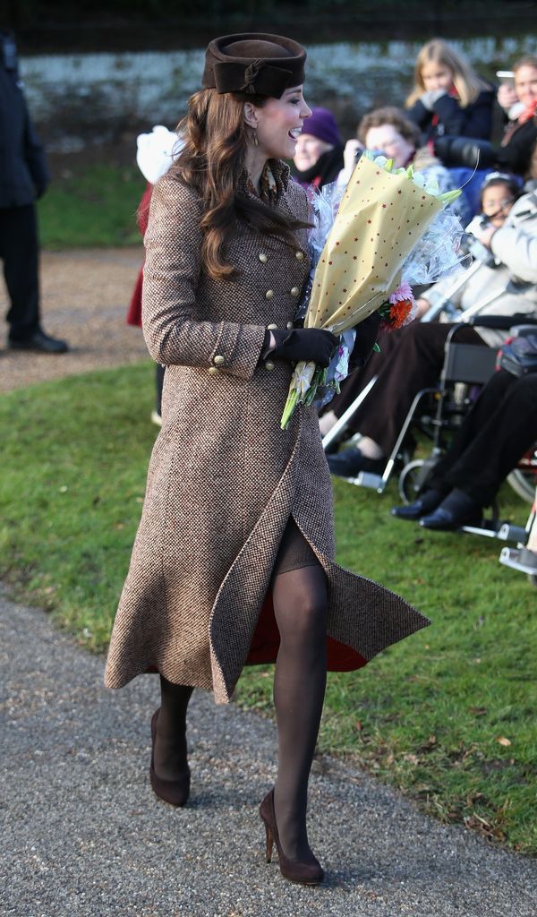  princess kate holding flowers in brown coat dress and heels