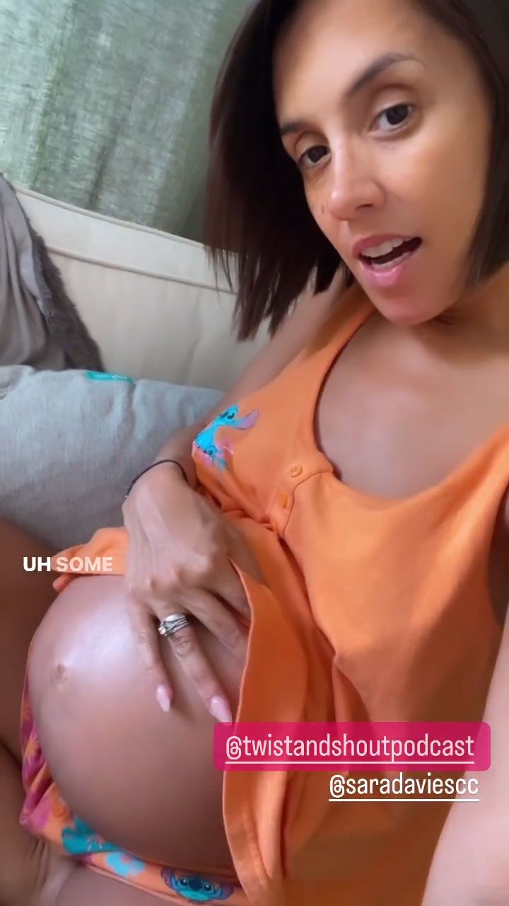 janette cradling baby bump 