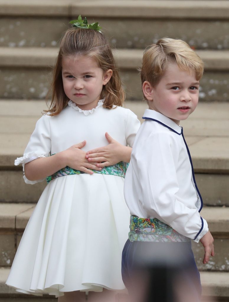 Princess Charlotte of Wales and Prince George of Wales attend Princess Eugenie of York and Mr. Jack Brooksbank's wedding at St. George's Chapel on October 12, 2018 in Windsor, England.