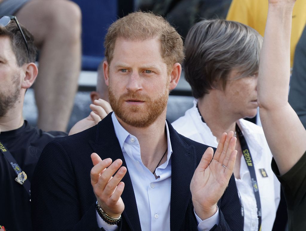 Prince Harry clapping