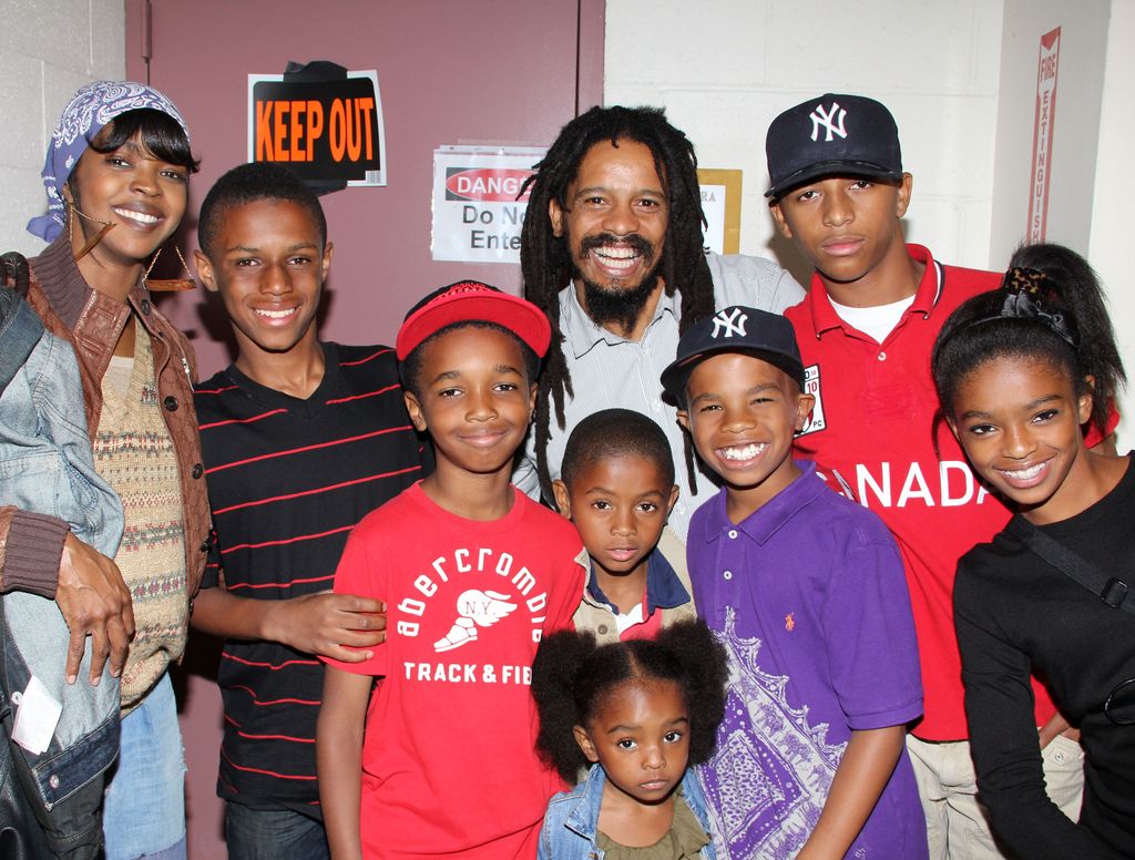 Lauryn Hill, Rohan Marley and family pose backstage at the hit musical "Spider-Man:Turn Off The Dark" on Broadway at The Foxwoods Theater on June 28, 2011 in New York City