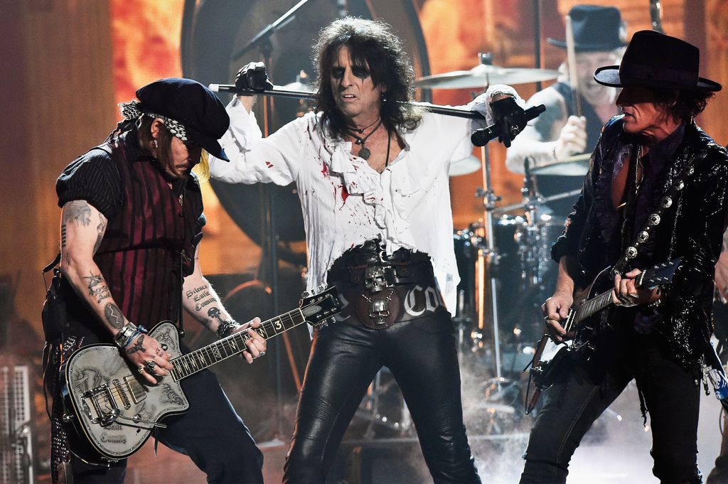 Johnny Depp, Alice Cooper, and Joe Perry of Hollywood Vampires perform onstage during The 58th GRAMMY Awards at Staples Center on February 15, 2016 in Los Angeles, California